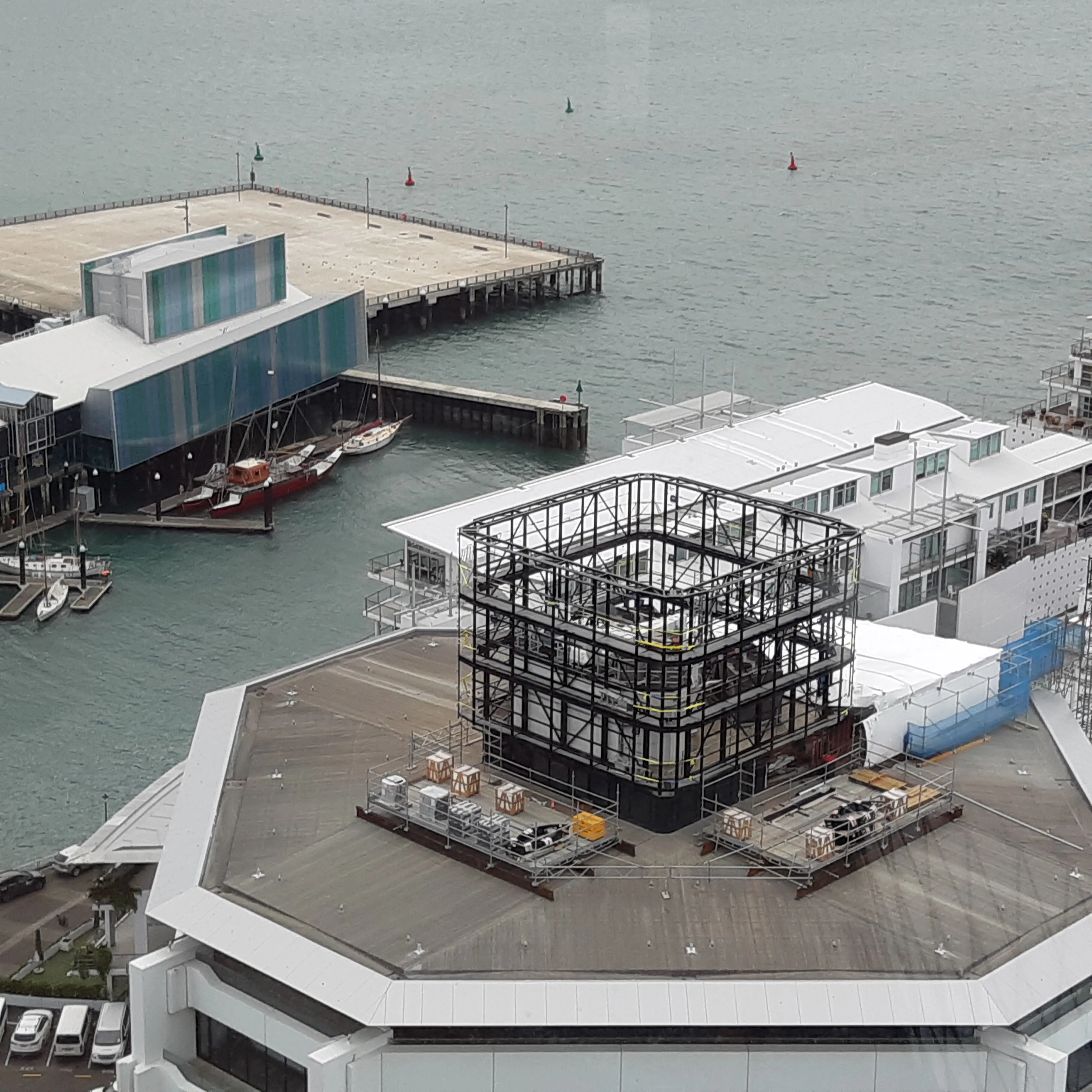 Rooftop deck structure with LED screen steel framework at 139 Quay Street Auckland commercial building