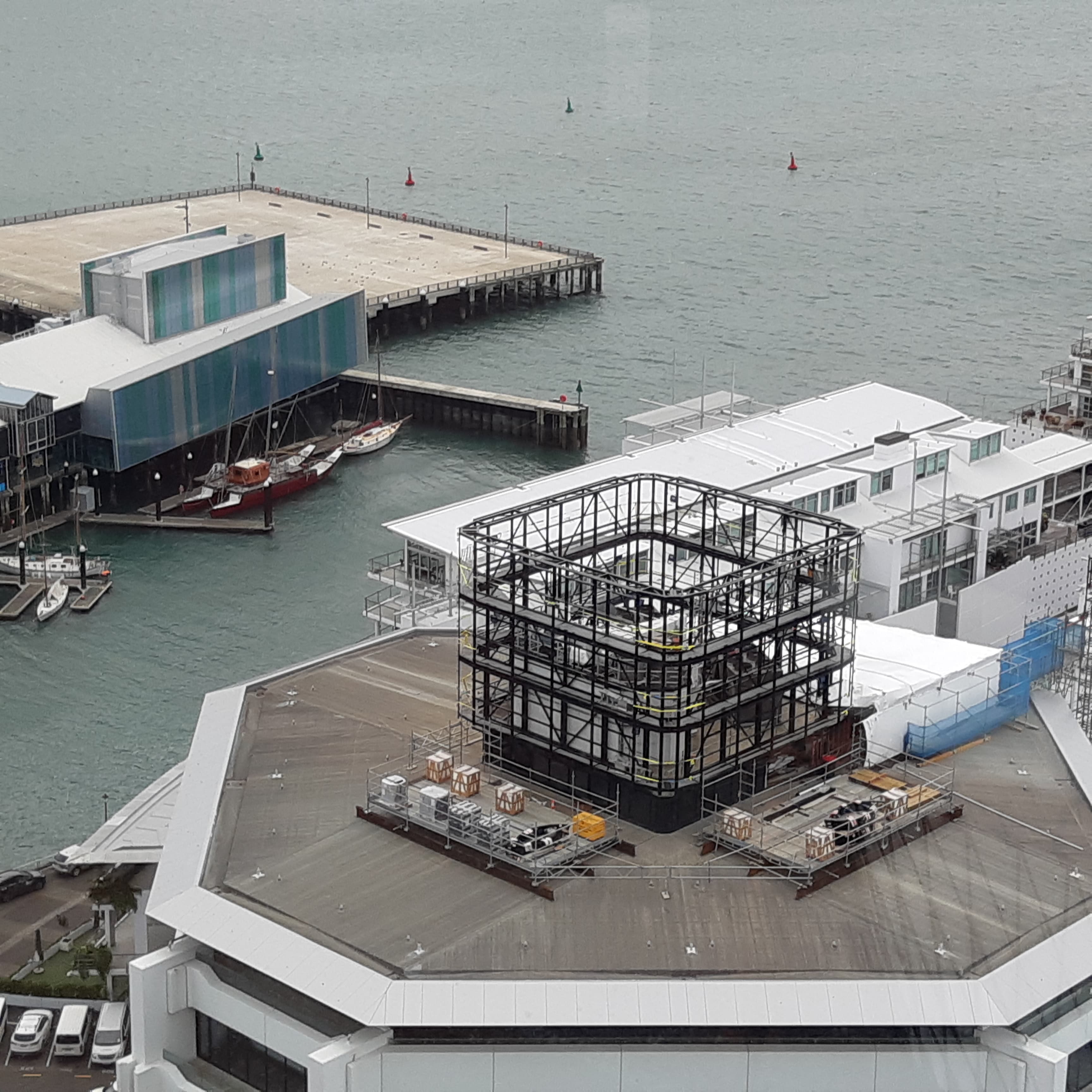 Rooftop deck structure with LED screen steel framework at 139 Quay Street Auckland commercial building